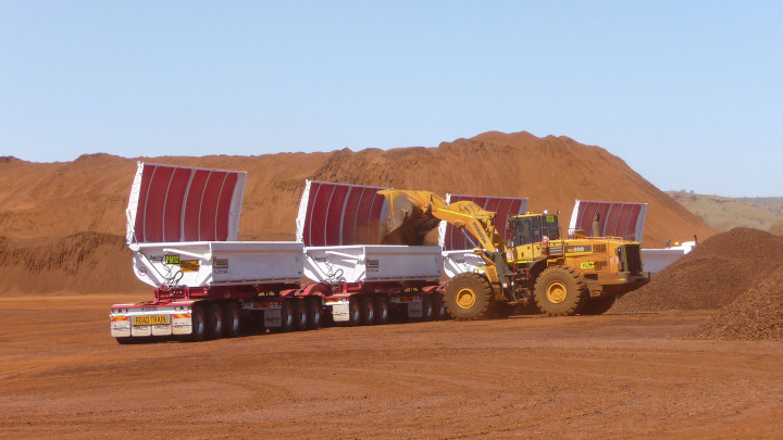 loader filling up road train containers