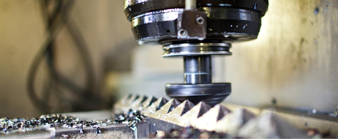 Close-up of machining tool, machining a piece of Hardox 400 wear steel plate.