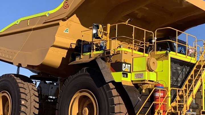 A mega mining haul truck in a lightweight design with body built in strong, hard and tough Hardox® steel.